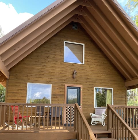 Enjoy morning sun or afternoon shade on your spacious porch overlooking the lake