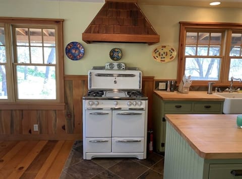 Cottage kitchen with 1950s wedge wood stove