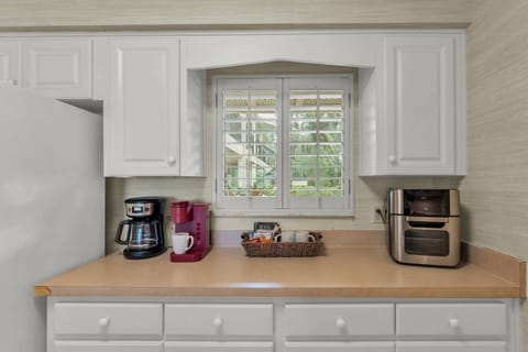Kitchen with plenty of counterspace & complete with a drip coffee maker, Keurig pod maker & air fryer!