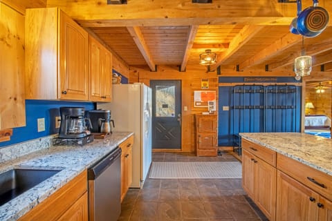 Full kitchen includes refrigerator, stove top, oven, microwave, dishawasher, and more!