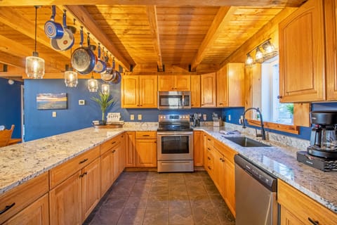 Full kitchen includes refrigerator, stove top, oven, microwave, dishawasher, and more!