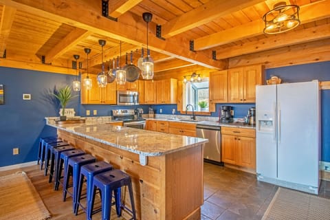 Full kitchen includes refrigerator, stove top, oven, microwave, dishawasher, and more!