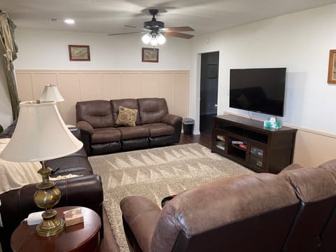 Another view of the family room and 55" Smart TV.