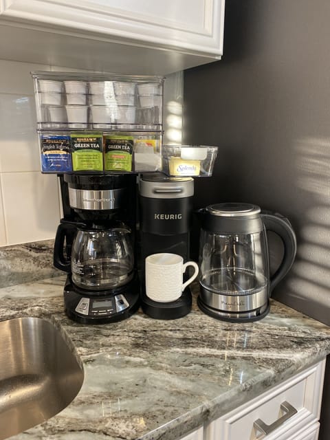 Keurig and Drip coffee makers
Hot water tea kettle, K-cups and Tea bags.