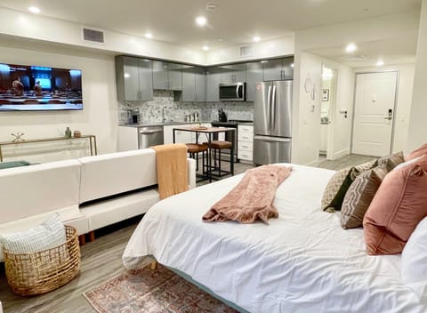 King Bed outfitted with luxury bedding atop a supportive hybrid mattress