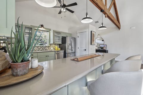 View from bar looking into the kitchen.