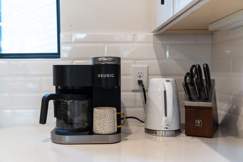 Dual coffee pot and single serving keurig.  And hot water kettle for tea drinkers.