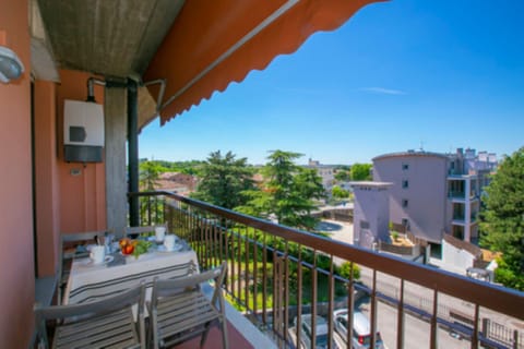 Balcony with table and chairs