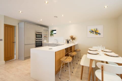 Sit at the kitchen bar and enjoy the cooking show