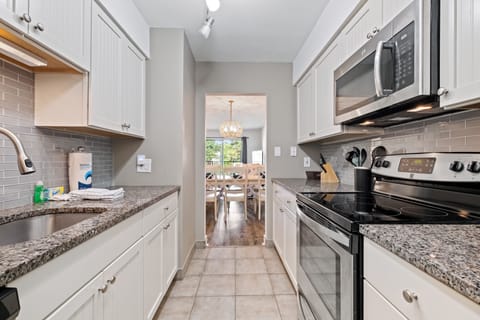 Beadboard cabinets with granite countertops 