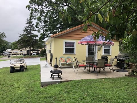 Quiet back porch, wonderful for morning coffee, includes a gas bbq grill.