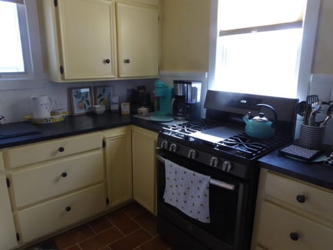 Kitchen fully supplied with all your cooking and dining needs.