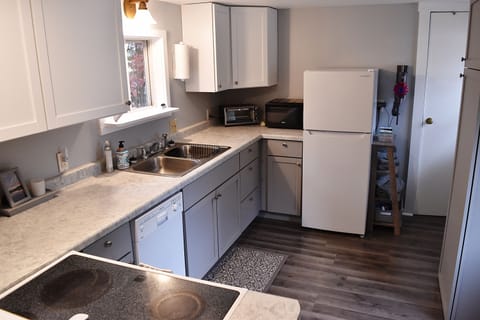 Cookware, dishes and basic spices included.