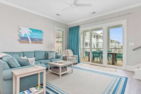 Let the sunshine in or block out with a click!  "Summertime and Livin' is Easy" with remote control blackout curtains in the family room.