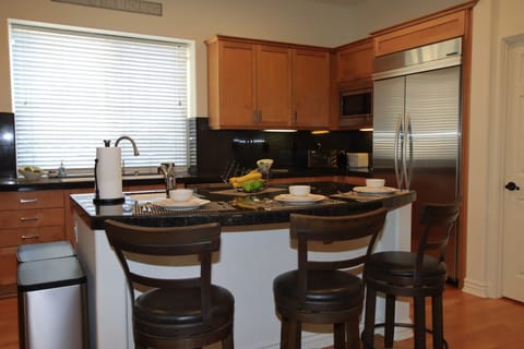 Kitchen with everything you can imagine, two sinks to keep conversation going.
