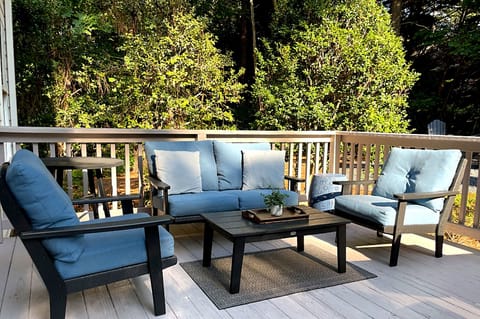 Secluded deck surrounded by towering pines — ideal for morning coffee or evening wine.