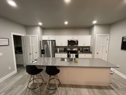 Full Size Kitchen with Stainless Steel Refrigerator, Dishwasher, Oven and Stove