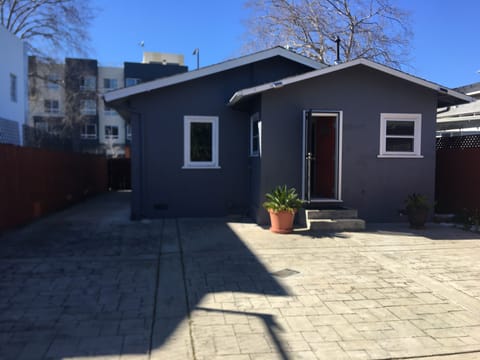 View of the back door of the house with entrance for guests.