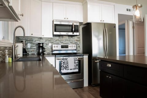 Floor #2 (Condo #2) kitchen which is fully equipped (2).