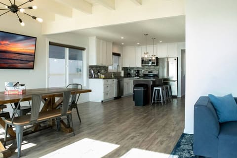 Floor #2 (Condo #2) open concept living room, dining room, and kitchen.