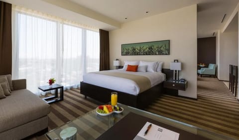 Unit with 1 King bed. Exact unit will be assigned upon arrival. Views, colors, and decor may vary.