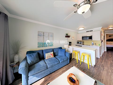 Living room connects with the kitchen.