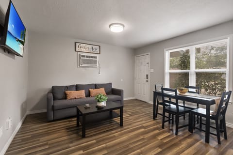Couch folds out into pull-out bed. Wall A/C and heating unit