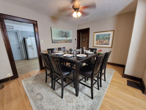 Spacious dining room seats 8 guests or can be downsized for smaller groups.