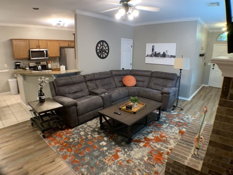 Living Room. Each end of the sectional is an electrical controlled recliner.
