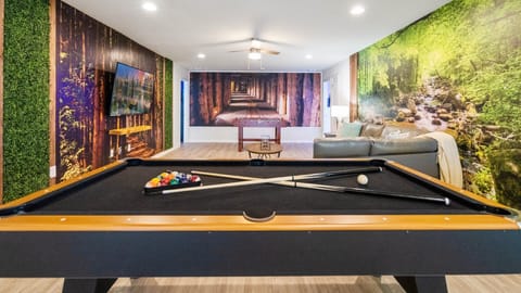 Have a hit of pool with friends in the upstairs games loft