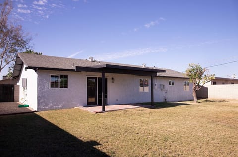 patio in the backyard, has a full size BBQ not pictured