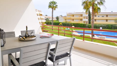 The apartment features a spacious terrace overlooking the condominium pool

#pool #summer #lovelystay