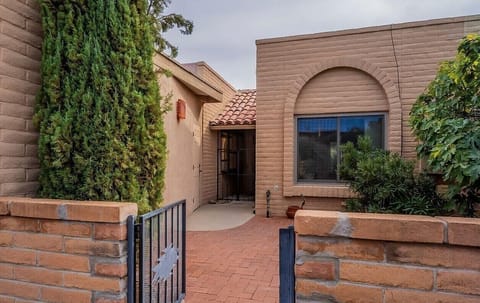 Entry gate leading to front patio and front door.