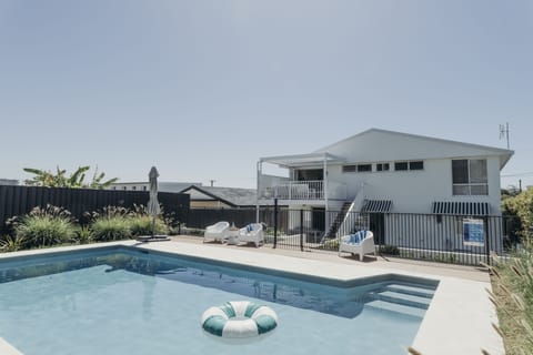 Family-friendly pool, fire pit and BBQ dining area and upper level deck