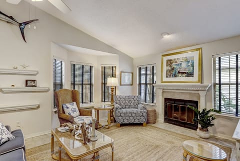 Comfortable Family Room with Ample Seating Centered Around a Large Flat Screen TV- Fireplace does not function