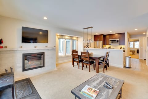 Living Room | Smart TV | Electric Fireplace | Queen Sleeper Sofa | Free WiFi