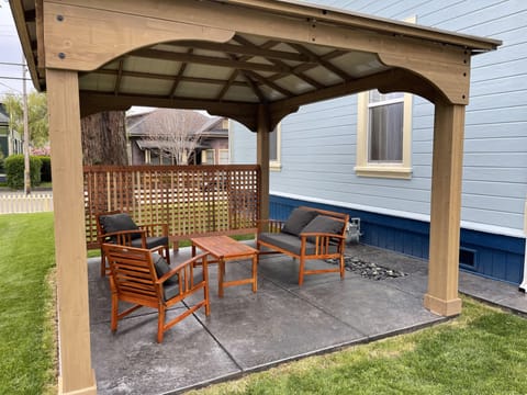 Nice outside sitting area with bbq and gas fire pit under the gazebo!