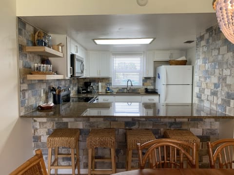 Bright and well organized kitchen. 