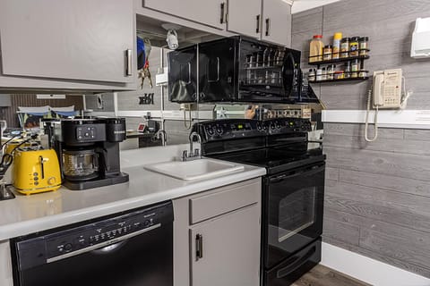 The fully equipped kitchen has a drip-style coffee maker and a Keurig.