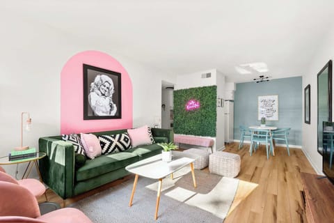 Enjoy the vibrant, eclectic living room with colorful textures—perfect for unwinding.

STR Permit # 2021028384