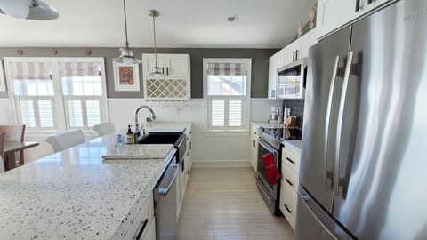 Nicely equipped kitchen with granite counter tops