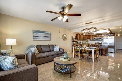 The living room provides a comfortable space to catch up with family and friends. 