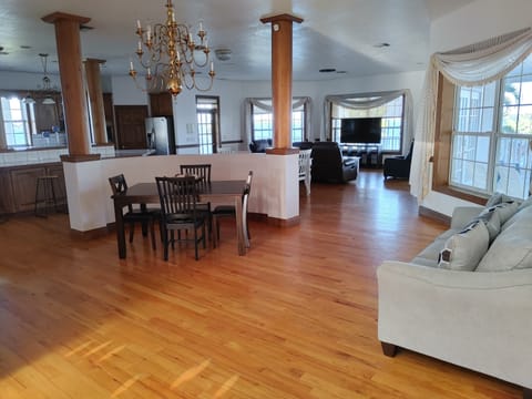 View of great room with two dining tables,  one for adults other for kids!