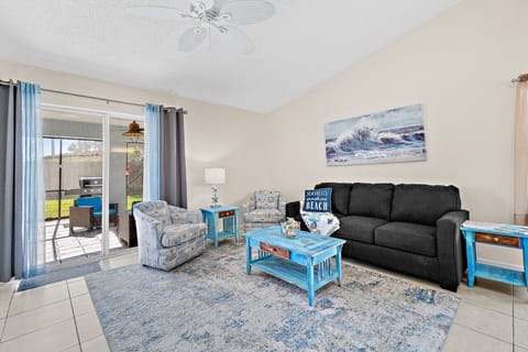 Living room with pull out sofa bed and Roku TV