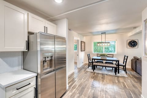 Another view of the kitchen and dining area