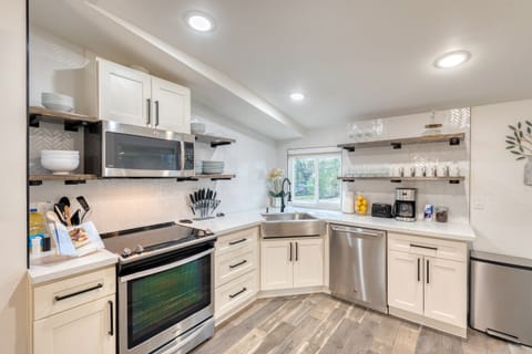 Big Open Kitchen with plenty of settings and tools to gather and prepare meals