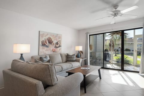 Living room inside this Miramar Beach vacation rental townhome