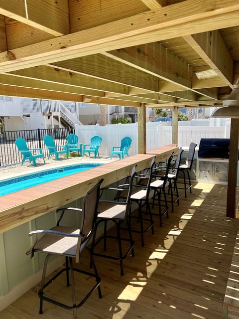 Outdoor grill by pool and the ocean!