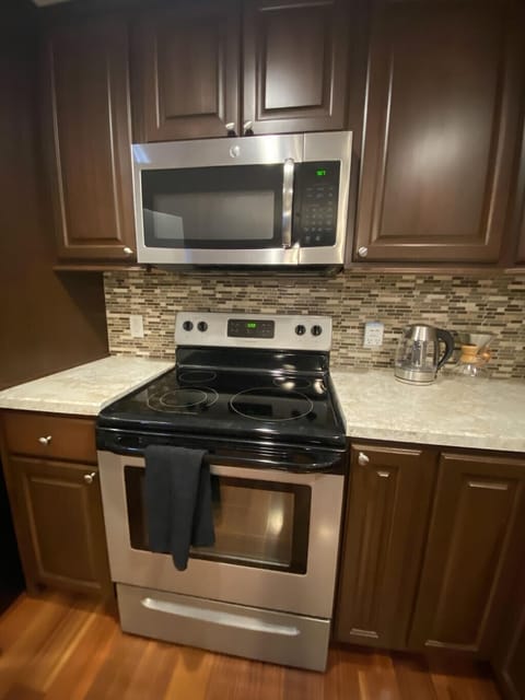 Kitchen also has toaster, electric kettle, and coffee maker.