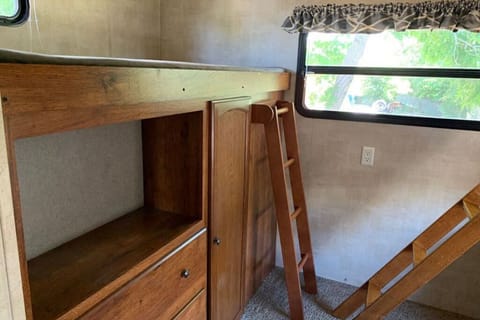 Extra storage beneath the single bunk.